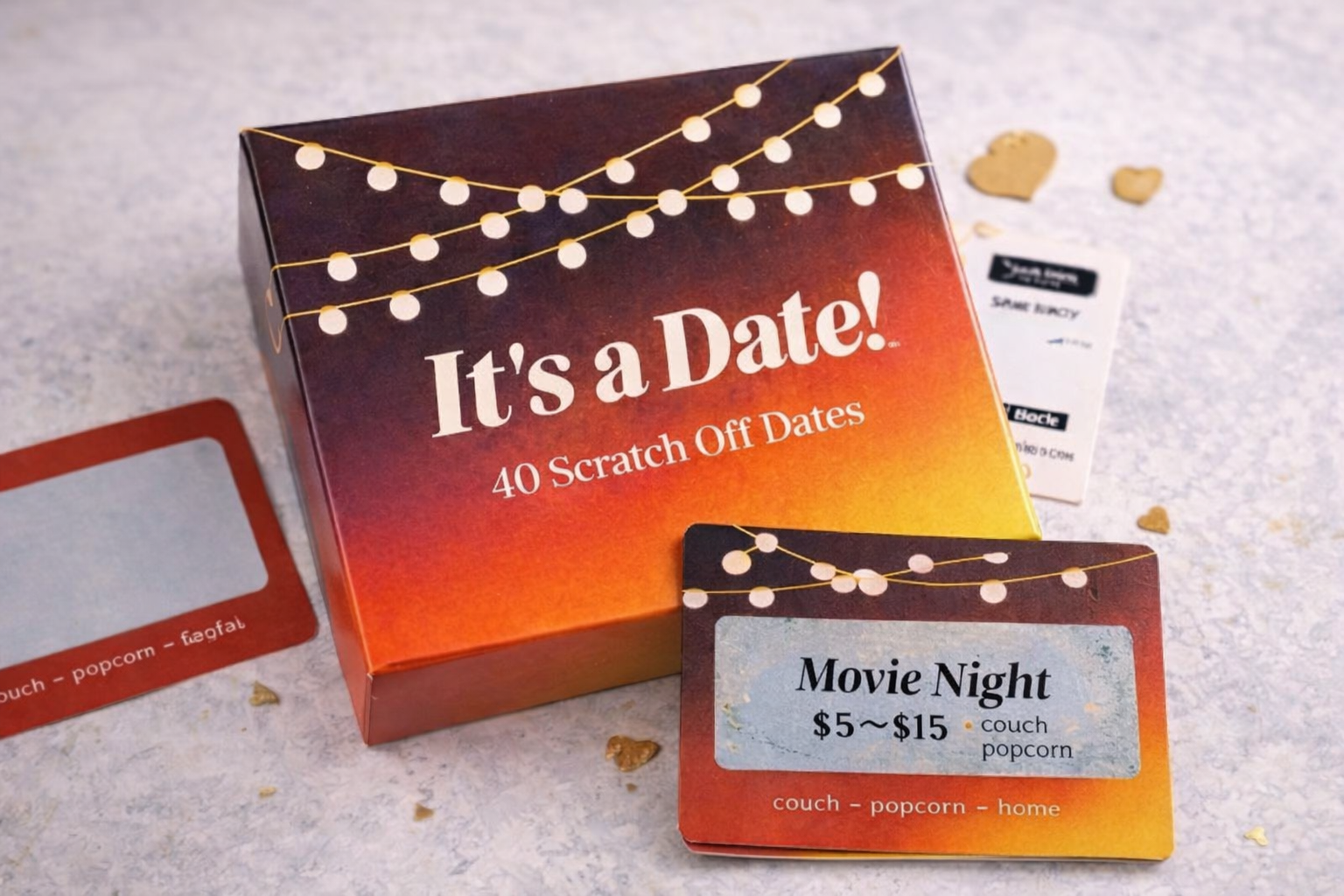 It’s a Date scratch-off date night cards showing a revealed Movie Night date idea